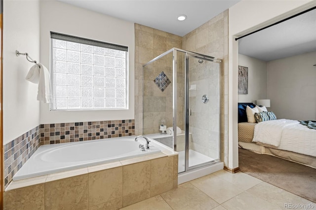 ensuite bathroom with a stall shower, tile patterned flooring, connected bathroom, and a bath