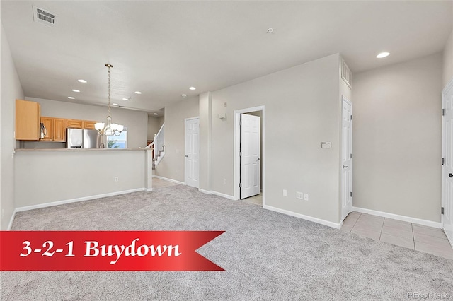 1401 W 85th Ave Unit F201, Federal Heights, CO 80260 - unfurnished living room with recessed lighting, a chandelier, carpet flooring, stairway, and baseboards