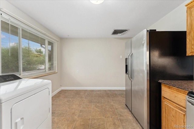 6721 Quay Ct, Arvada, CO 80003 - laundry area featuring washer / dryer and baseboards