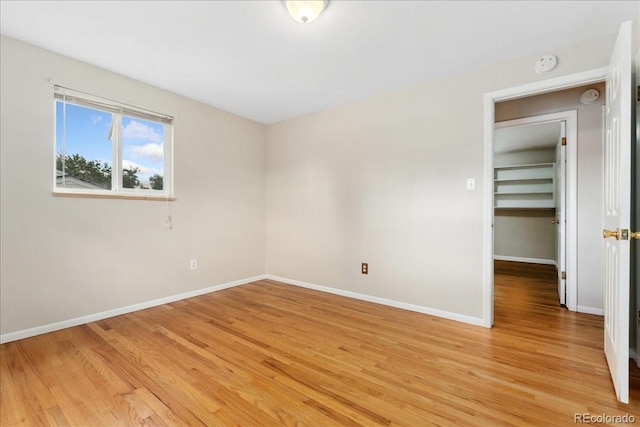 6721 Quay Ct, Arvada, CO 80003 - spare room with a smoke detector and light wood finished floors