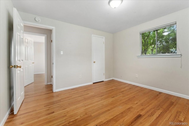 6721 Quay Ct, Arvada, CO 80003 - unfurnished bedroom featuring light wood-style flooring
