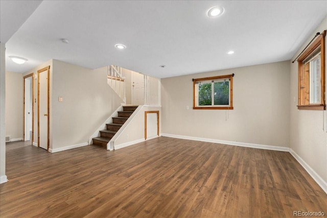 6721 Quay Ct, Arvada, CO 80003 - below grade area featuring stairs, wood finished floors, and recessed lighting