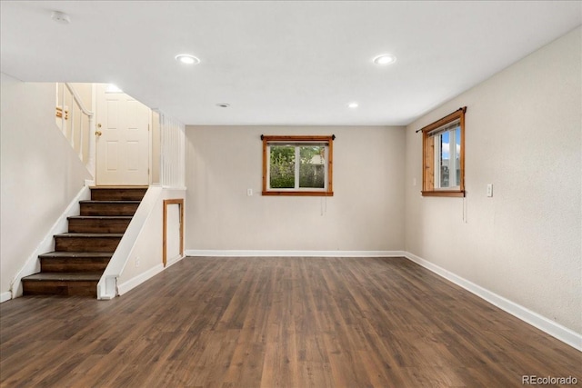 6721 Quay Ct, Arvada, CO 80003 - below grade area featuring stairway, dark wood finished floors, and recessed lighting