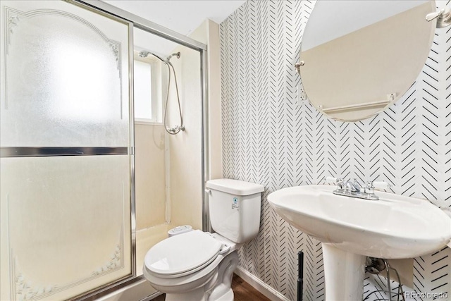 6721 Quay Ct, Arvada, CO 80003 - full bathroom featuring wallpapered walls and a shower stall
