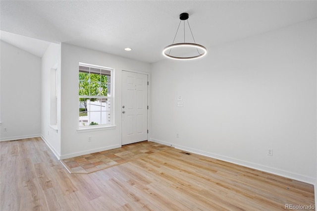 14247 Pikeminnow Pl, Broomfield, CO 80023 - entryway featuring wood finished floors and baseboards