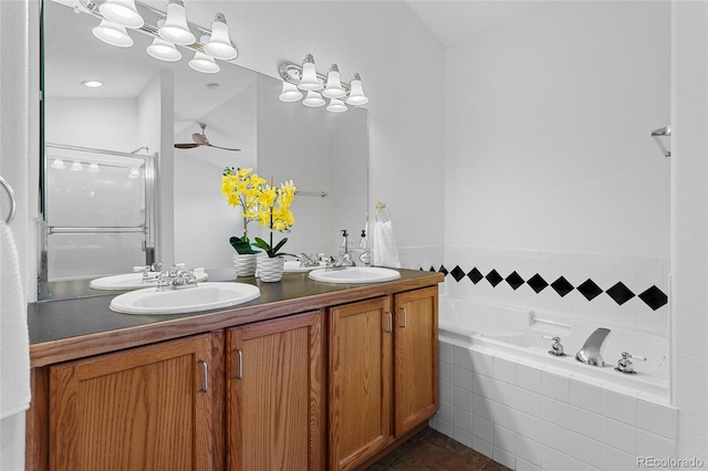 14247 Pikeminnow Pl, Broomfield, CO 80023 - bathroom featuring double vanity, a ceiling fan, a bath, and tile patterned flooring