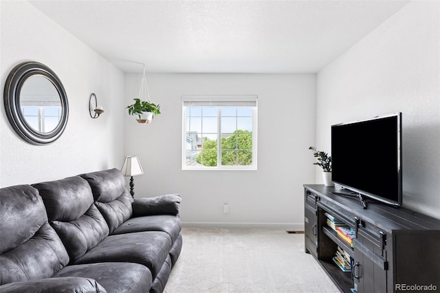 4280 Pioneer Pl, Brighton, CO 80601 - living room featuring light carpet and baseboards