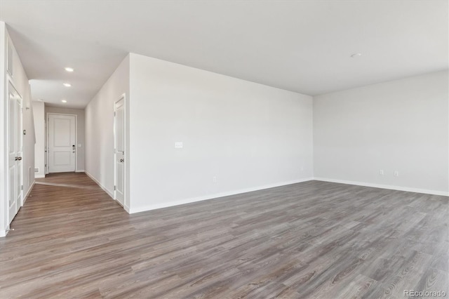 spare room featuring light wood-type flooring