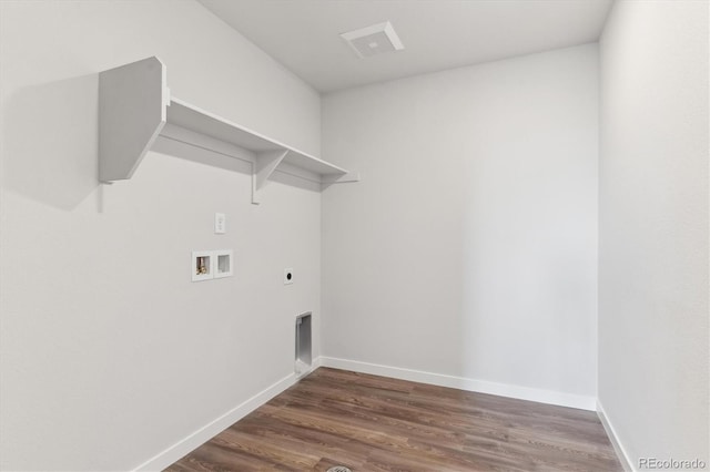 washroom featuring dark hardwood / wood-style floors, electric dryer hookup, and hookup for a washing machine