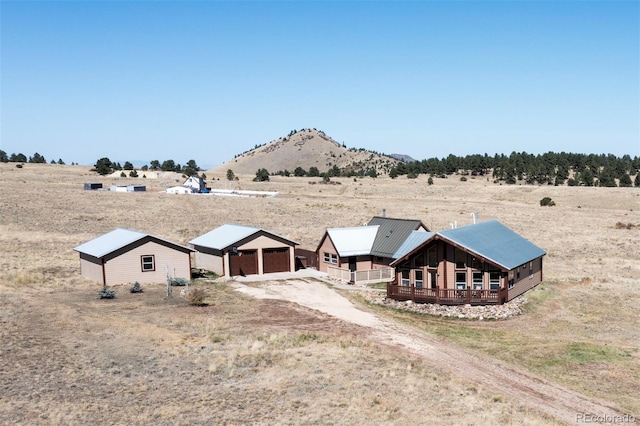 exterior space with a mountain view and a rural view