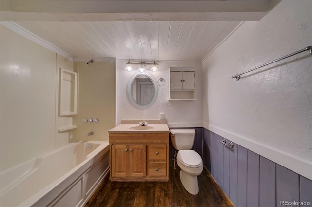 full bathroom featuring wood-type flooring, vanity, bathing tub / shower combination, and toilet