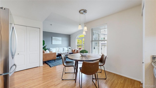 1670 S Deframe St Unit C2, Lakewood, CO 80228 - dining area with light wood finished floors and baseboards