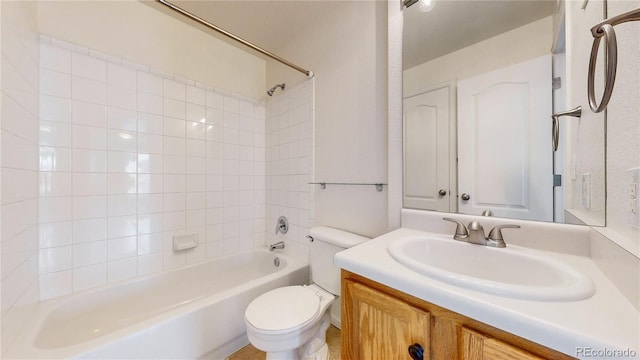 1670 S Deframe St Unit C2, Lakewood, CO 80228 - bathroom featuring toilet, vanity, and tub / shower combination