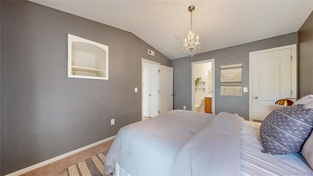 1670 S Deframe St Unit C2, Lakewood, CO 80228 - bedroom with a chandelier, carpet floors, vaulted ceiling, baseboards, and ensuite bath