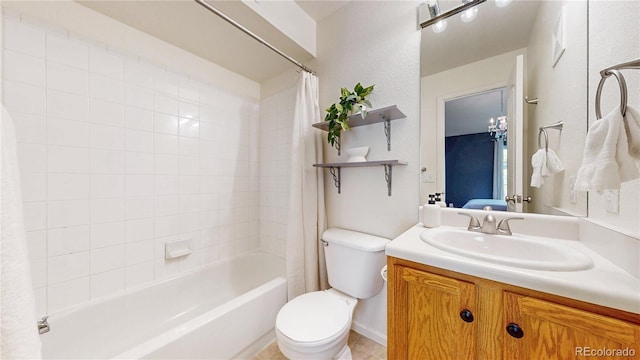 1670 S Deframe St Unit C2, Lakewood, CO 80228 - bathroom featuring shower / bath combination with curtain, vanity, and toilet