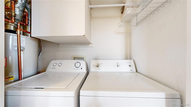 1670 S Deframe St Unit C2, Lakewood, CO 80228 - laundry area with washing machine and dryer and water heater