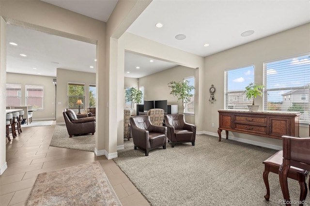 living area with light tile patterned floors