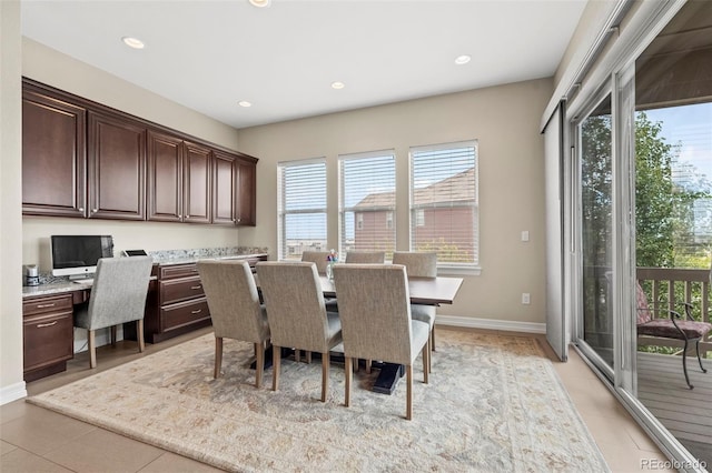 tiled dining room with built in desk