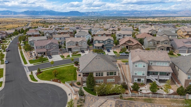 drone / aerial view featuring a mountain view