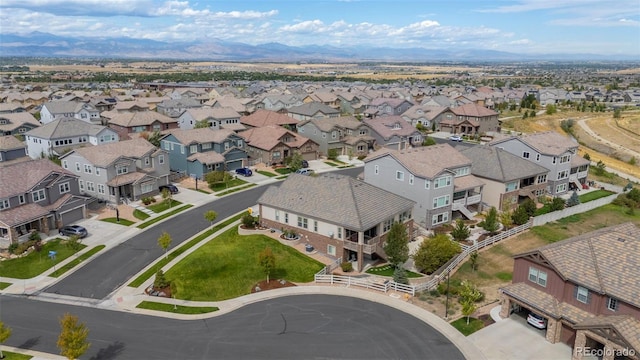 drone / aerial view featuring a mountain view