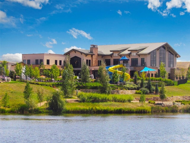 view of property with a water view