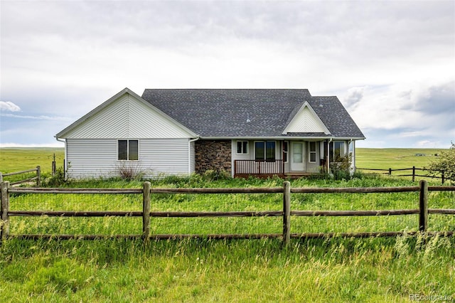 27190 Private Road 139, Agate, CO 80101 - view of front facade with a porch, roof with shingles, and a view of countryside