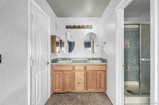 27190 Private Road 139, Agate, CO 80101 - bathroom featuring a stall shower and double vanity