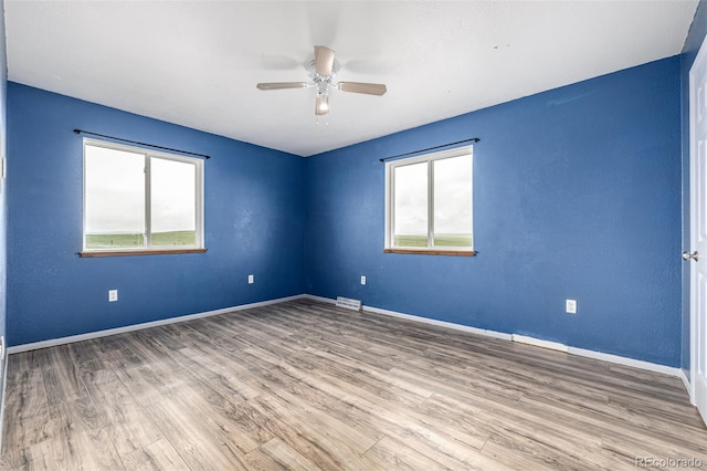 27190 Private Road 139, Agate, CO 80101 - empty room with wood finished floors and a ceiling fan