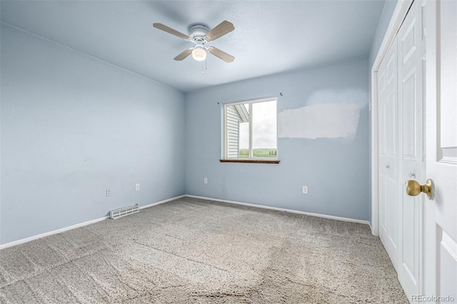 27190 Private Road 139, Agate, CO 80101 - unfurnished bedroom featuring carpet, a closet, and a ceiling fan
