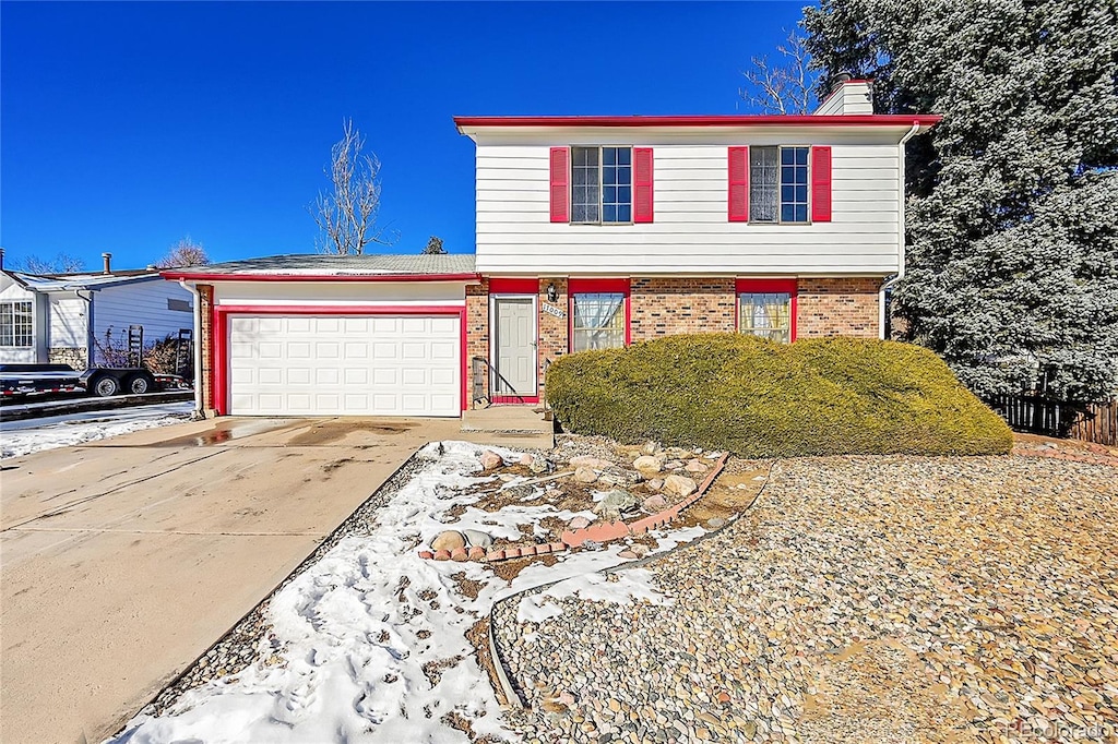 view of front of home with a garage