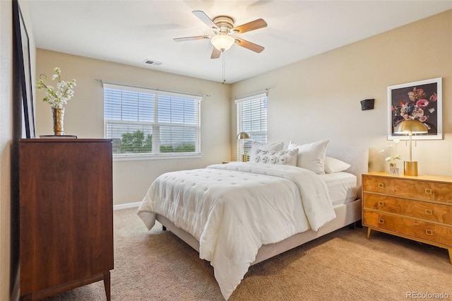 2605 Gray Wolf Loop, Broomfield, CO 80023 - bedroom featuring light carpet, baseboards, and ceiling fan