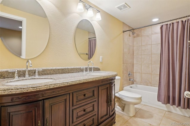 2605 Gray Wolf Loop, Broomfield, CO 80023 - bathroom with tile patterned flooring, double vanity, toilet, and shower / bath combo with shower curtain