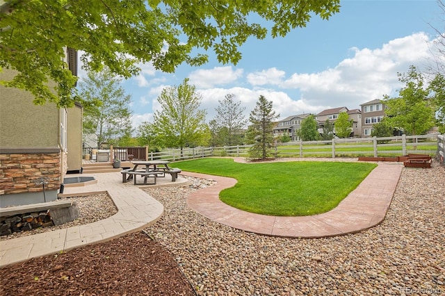 2605 Gray Wolf Loop, Broomfield, CO 80023 - view of yard featuring a patio and a residential view