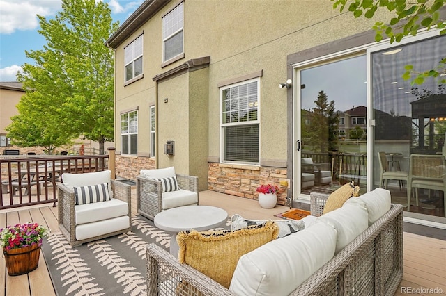 2605 Gray Wolf Loop, Broomfield, CO 80023 - wooden terrace with an outdoor living space