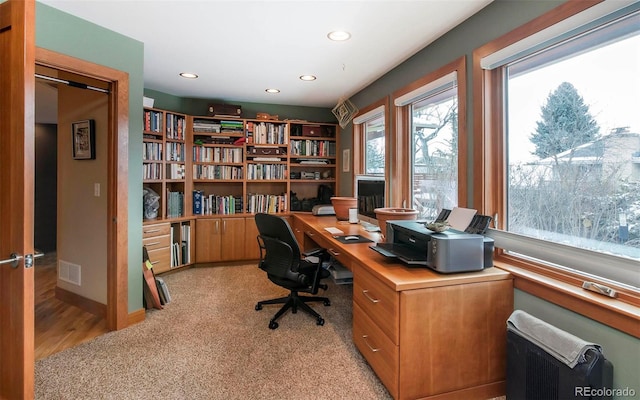 home office featuring recessed lighting, visible vents, light carpet, and baseboards