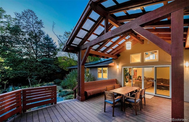 wooden deck with outdoor dining area