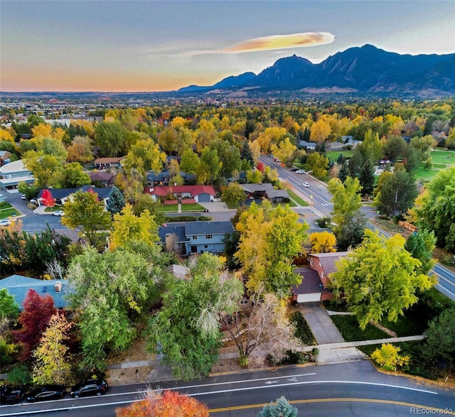 aerial view at dusk with a mountain view