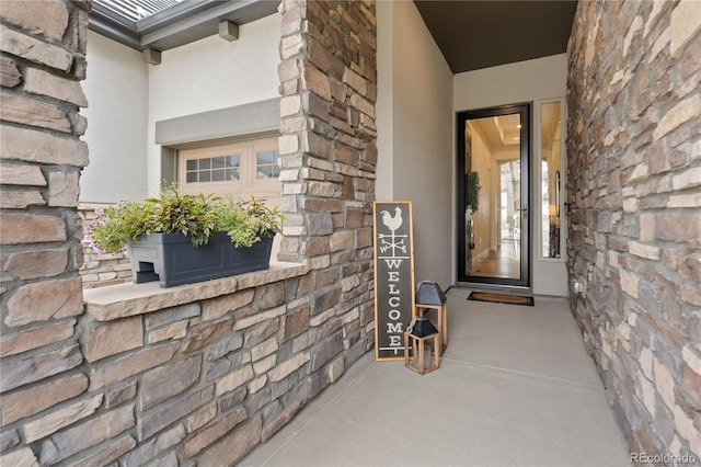 3147 S Quaker St, Morrison, CO 80465 - property entrance with stucco siding