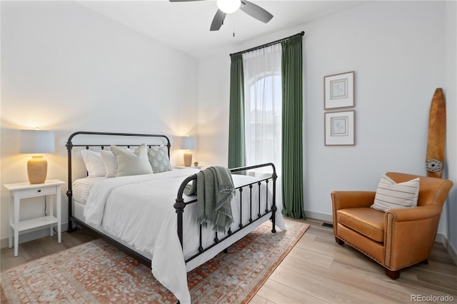 3147 S Quaker St, Morrison, CO 80465 - bedroom featuring light wood finished floors and ceiling fan
