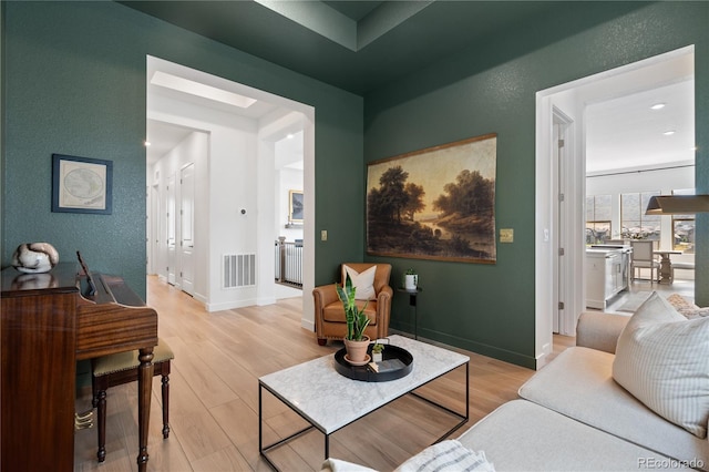 3147 S Quaker St, Morrison, CO 80465 - living room featuring light wood-style floors and baseboards