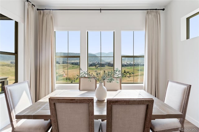 3147 S Quaker St, Morrison, CO 80465 - dining area featuring a mountain view and plenty of natural light