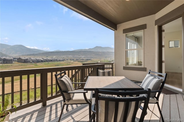 3147 S Quaker St, Morrison, CO 80465 - deck featuring a mountain view and outdoor dining area