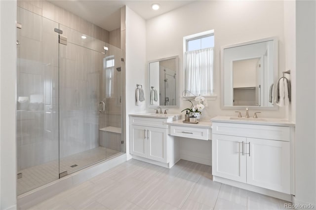 3147 S Quaker St, Morrison, CO 80465 - bathroom with a shower stall and double vanity