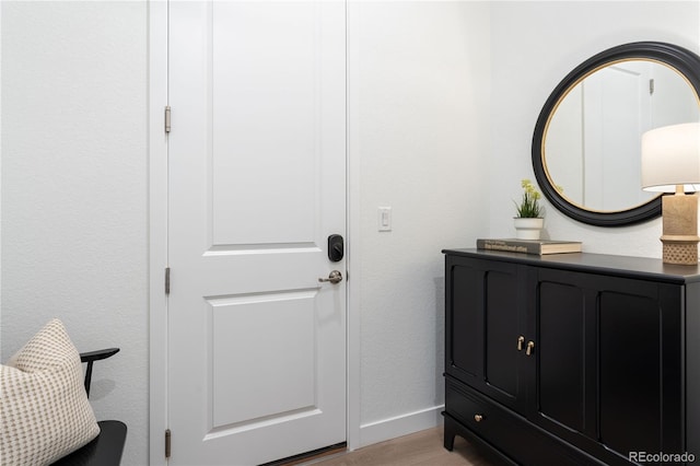 3147 S Quaker St, Morrison, CO 80465 - doorway to outside with light wood finished floors and baseboards