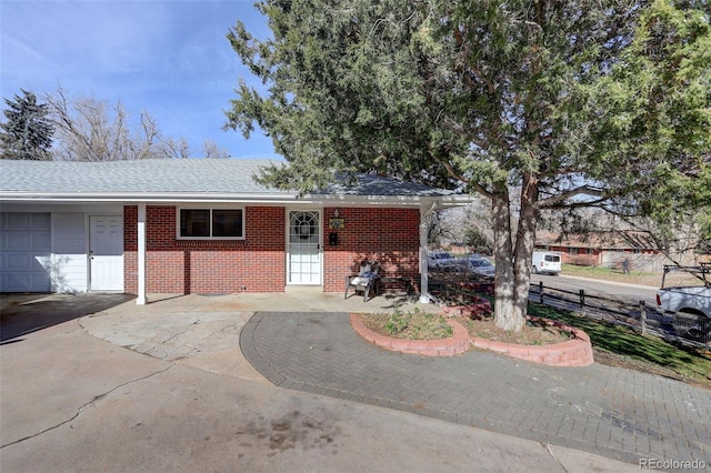 view of front of home featuring a garage