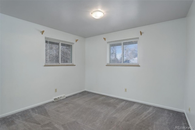 empty room with carpet floors