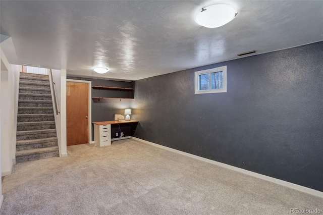 basement with light carpet