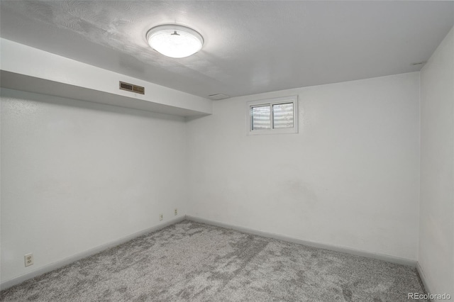 basement featuring carpet flooring