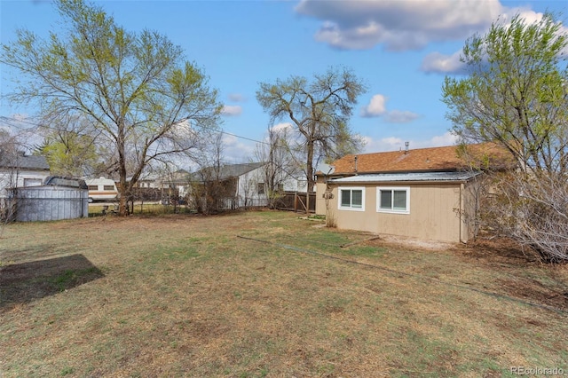 view of yard featuring fence
