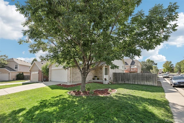 obstructed view of property with a front lawn, fence, a residential view, and a garage
